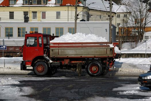 Driving snow away. Norwegian winter.
Larvik, Vestfold, Norway. - 2006.