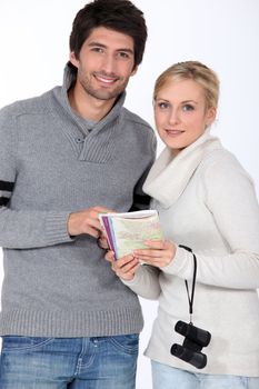 Couple with a map book