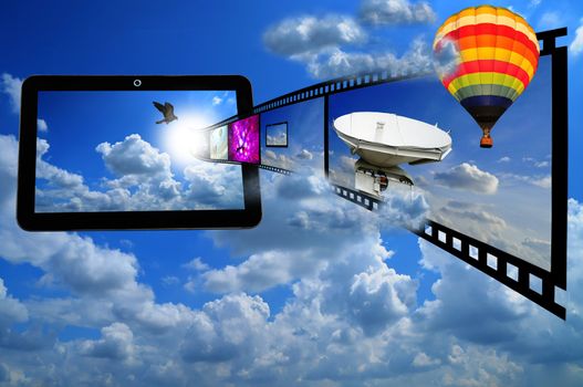 Tablet PC with Film strip and Ballon as concept of streaming 3d video on tablet 