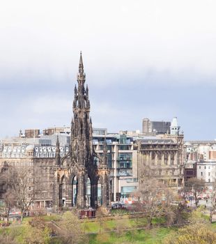 Edinburgh monument with Skylines building Scotland UK