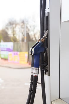 old gas pump nozzles in station