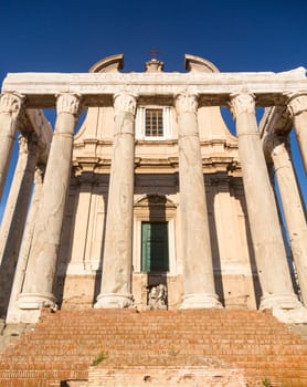 Details of remains and ruins in Ancient Rome Italy showing Temple of Antoninus and Faustina