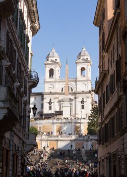 ROME, ITALY - JANUARY 27: Tourists sitting on Spanish Steps in Rome on January 27, 2013. The 138 steps were renovated in 1995
