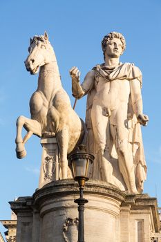 Facade of Comune di Roma or town hall in Rome Italy with statue