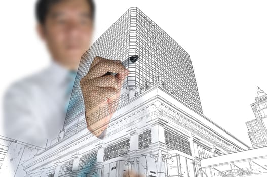 Businessman draw modern building and cityscape