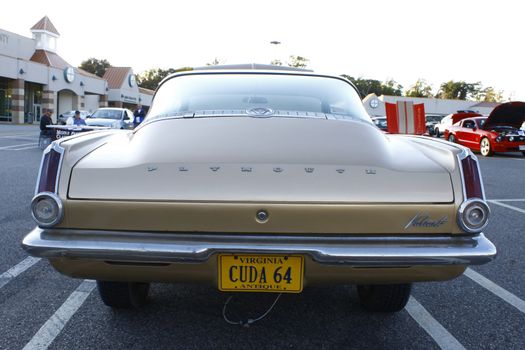 GLOUCESTER, VA, USA - OCTOBER 14: Vintage 1964 Cuda in the Middle Peninsula Classic Cruisers Club weekly Car Show. Main Street Center. October 14, 2011 in Gloucester, VA, USA