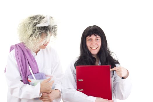 Female cleaners in white work coats