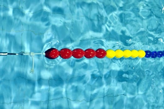 Blue water in a swimming pool useful as a background