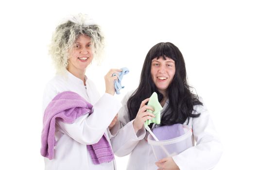 Female cleaners in white work coats