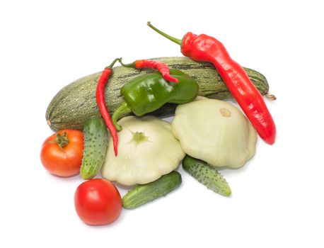 Crop of fresh vegetables on a white background.