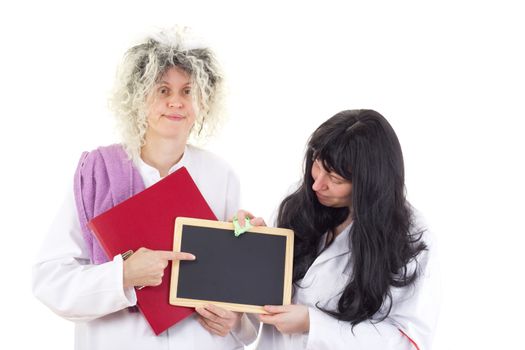 Female cleaners in white work coats