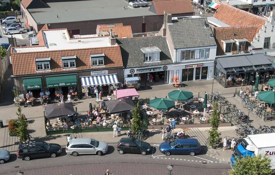 People having fun on  a terrace in Renesse , Holland, the first day this summer with sun and good temperature