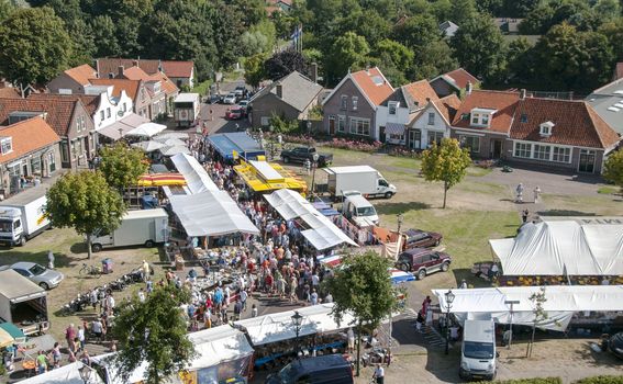 people shopping on the market in Renesse  a small village in holland