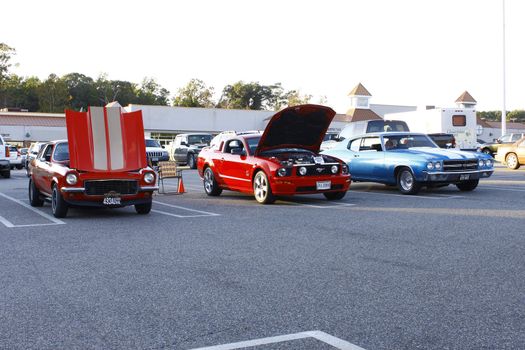 GLOUCESTER, VA, USA - OCTOBER 14: A line of classic antique cars the Middle Peninsula Classic Cruisers Club weekly Car Show. Main Street Center. on October 14, 2011 in Gloucester, VA, USA