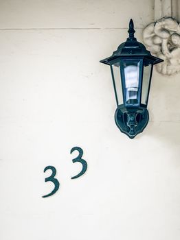 An image of the number 33 on the wall