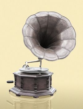 Vintage Gramophone with disc isolated on grunge background