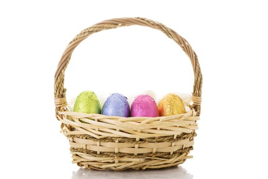 Wicker easter basket isolated on white
