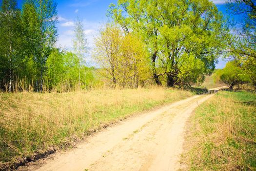 Dirty rural road in countryside