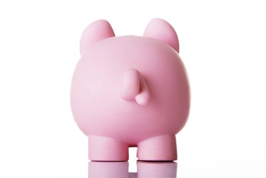 Piggy bank back. Isolated on white.