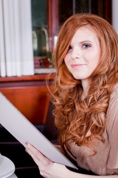 man and woman in restaurant waiter bring card and order food