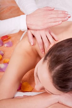 young attractive smilig woman doing wellness spa relaxing massage