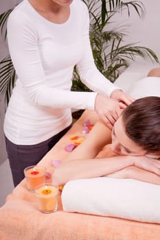 young attractive smilig woman doing wellness spa relaxing massage