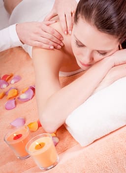 young attractive smilig woman doing wellness spa relaxing massage