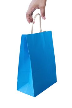 Hand and shopping bag isolated on white