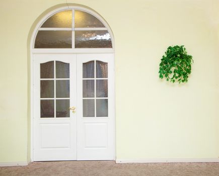door-arch in the yellow wall. Interior Indoor