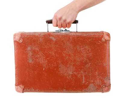 Vintage red suitcase in male hand isolated over white background 