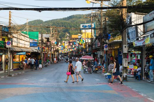 PHUKET, THAILAND - Jan 28: Patong Bangla road with tourists and barkers at day on Jan 28, 2013 in Phuket, Thailand. Bangla road is a famous tourists place with bars and discos. 