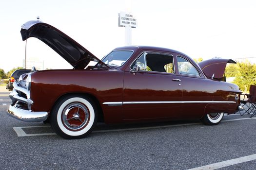 GLOUCESTER, VA, USA -OCTOBER 14: Vintage 1949 Ford Custom in the Middle Peninsula Classic Cruisers Club weekly Car Show. Main Street Center. oCTOBER 14, 2011 in Gloucester, VA, USA