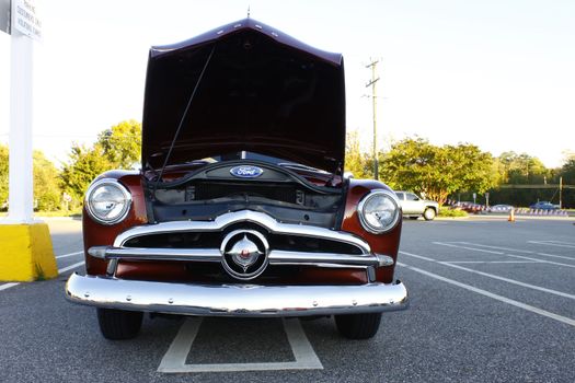 GLOUCESTER, VA, USA -OCTOBER 14: Vintage 1949 Ford Custom in the Middle Peninsula Classic Cruisers Club weekly Car Show. Main Street Center. oCTOBER 14, 2011 in Gloucester, VA, USA