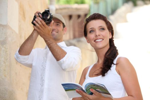 Tourists photographing monuments