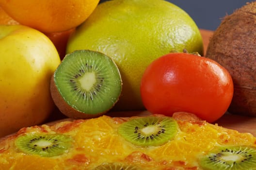 homemade sweet pizza with fruit.with orang kiwi,sauce