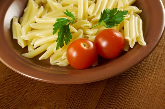 delicious macaroni pasta on wooden table