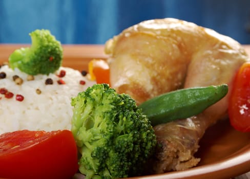 Rice and chicken  and vegetables.сloseup