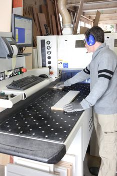 Engineer preparing wood