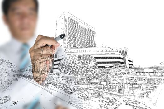 Business man draw modern building and cityscape