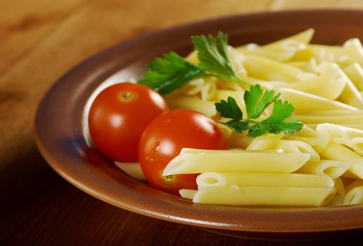 delicious macaroni pasta on wooden table