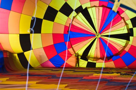 CHIANG MAI, THAILAND - NOV 26 : Participants blow up their balloons in the International Balloon Festival on November 26,2011 at the Prince Royal's College in Chiang Mai Thailand.