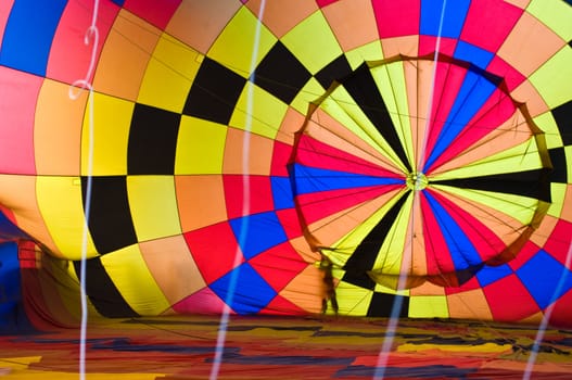 CHIANG MAI, THAILAND - NOV 26 : Participants blow up their balloons in the International Balloon Festival on November 26,2011 at the Prince Royal's College in Chiang Mai Thailand.