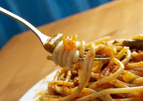  pasta with tomato  sauce  on wooden table