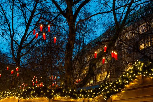 Christmas market - beautifully decorated stands and candles in the trees