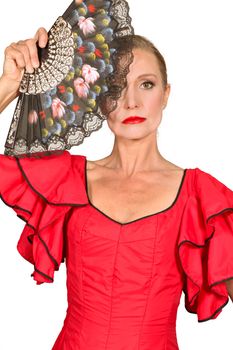 Woman in flamenco dress with fan