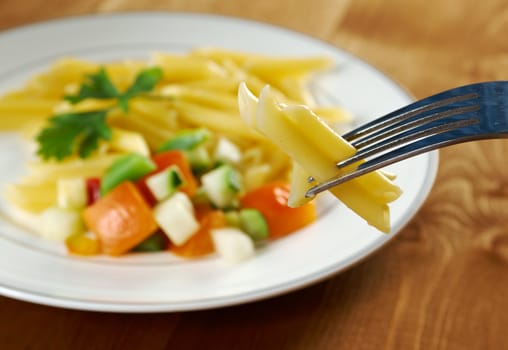 delicious macaroni pasta on wooden table