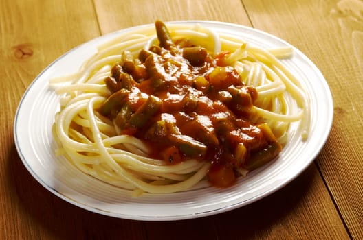  pasta with tomato  sauce  on wooden table