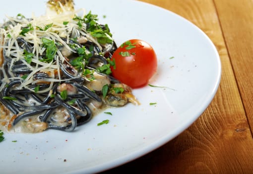 Spaghetti al Nero di Seppia.pasta nera algaes, seafoods,