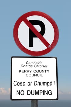 no parking and no dumping sign on a cliff edge in ballybunion county kerry ireland