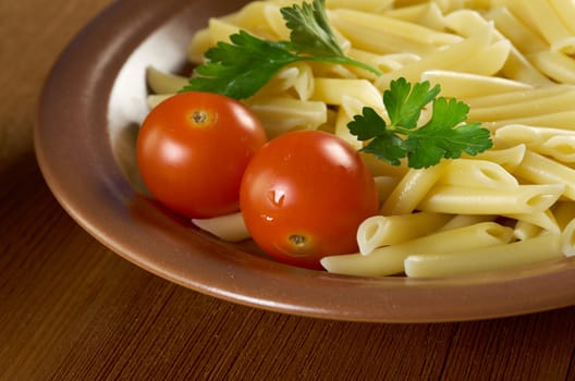 delicious macaroni pasta on wooden table